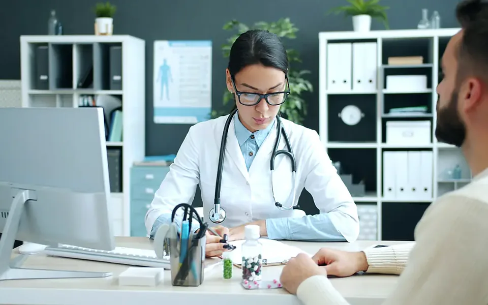 Dentist reviewing a three-dimensional scan with a patient
