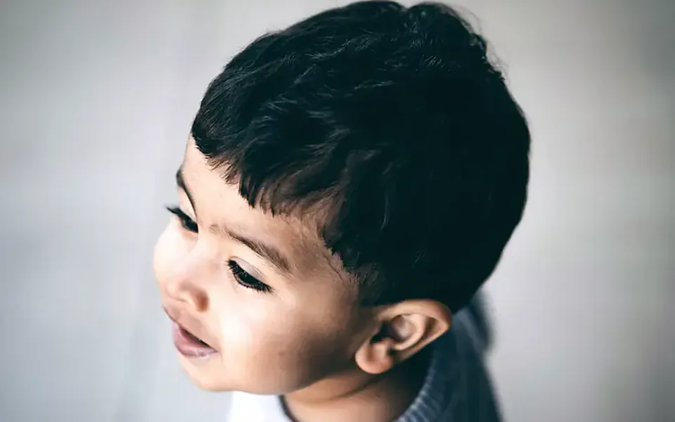 Young child smiling before a dental check-up