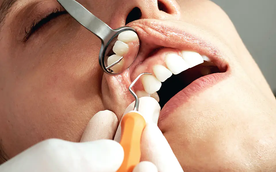 Dental examination in progress at Pier Point Dental