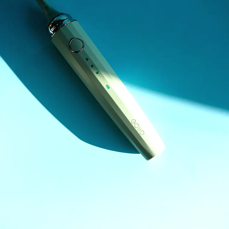 Dental handpiece resting on a clean surface