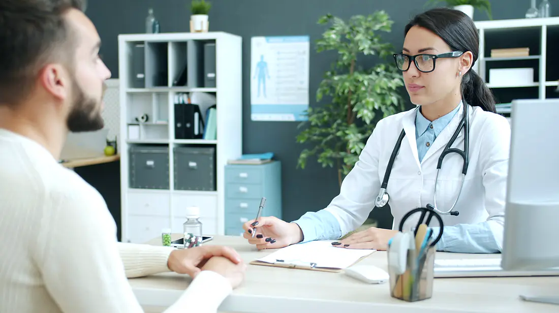 Dentist and patient discussing a proposed smile design