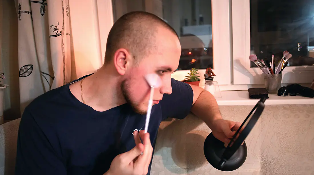 Patient brushing at the mirror as part of a daily home-care routine